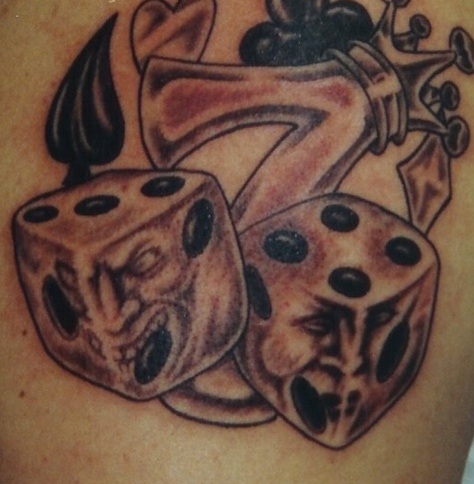 A Cute Spider Tattoo with Dice