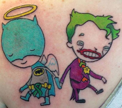 A cartoonish batman and joker tattoo