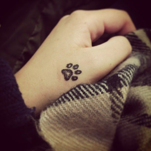 Small Paw Print Hand Tattoo Design