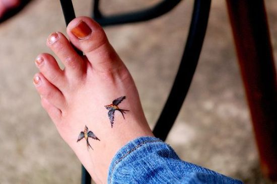 Pair of Birds In Color Tattoo on Foot