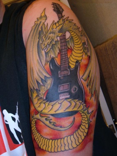 Full Sleeve Dragon Tattoo With Guitar