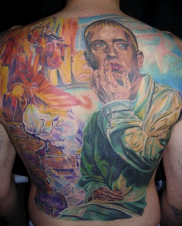 Water Color Eminem Tattoo with his Photo Depicted