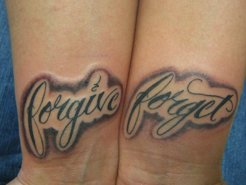 Tattoo Lettering Forgive Forget on Wrist