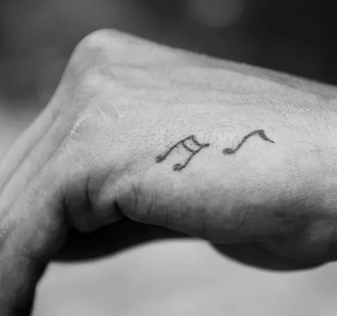 Small Music Note Tattoo For Guys