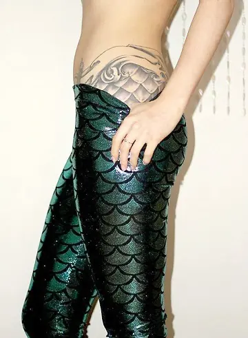 Colorful mermaid scale tattoo  Mermaid scales tattoo Mermaid tattoos Scale  tattoo