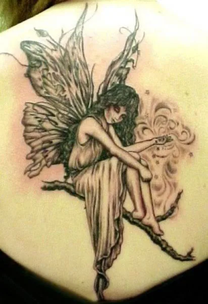 Half good half evil fairy tattoo