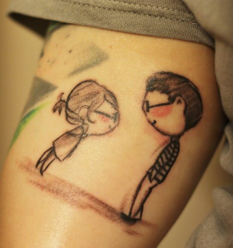 Boy and Girl Couple Tattoos on Upper Arm