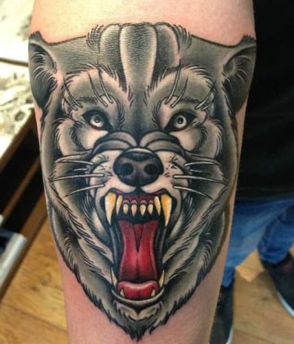 Traditional wolf head done by ryne at inksmith and Rodgers Jax Fl  r tattoos