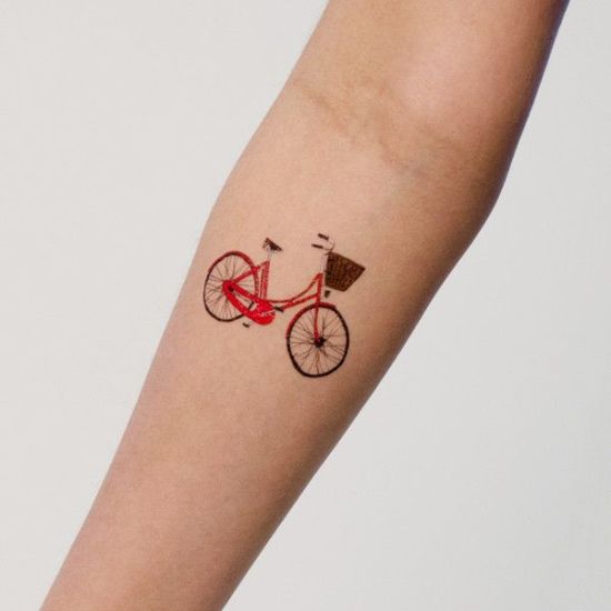 A Cycle Decal Tattoo On Fore Arms
