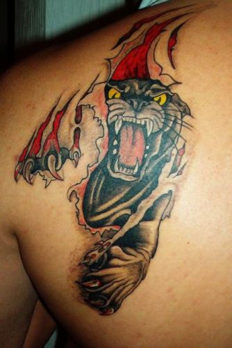 Flesh Tearing Panther Tattoo Designs On Back