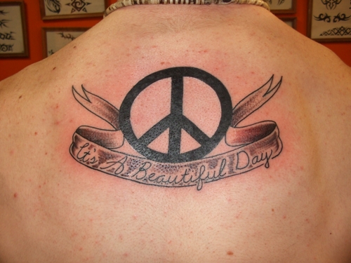 Peace Sign And Banner Tattoo