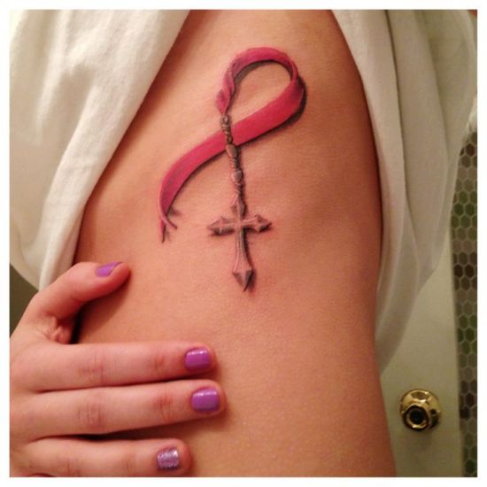 A Cross And Ribbon Breast Side Tattoo