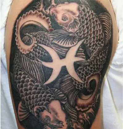 Koi fish tattoo representing pisces zodiac sign