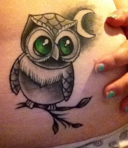 Big eyed owl tattoo