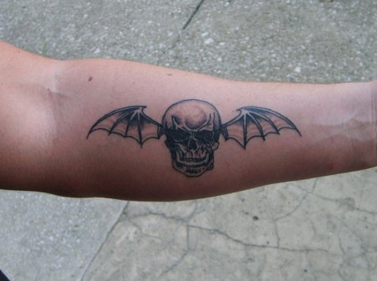 Simple Skull With Wings Forearm Tattoo Designs