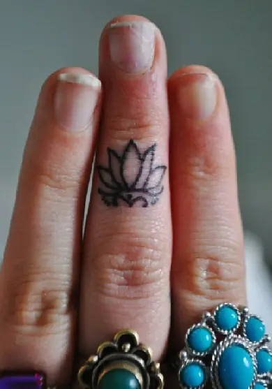 Lotus Flower Tattoo On Finger by David Torres