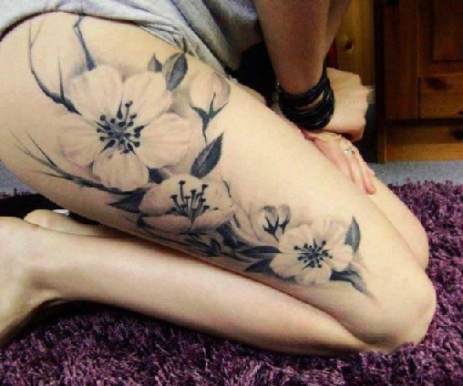 White Cherry Blossom Tattoo On Thigh