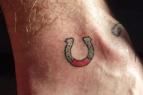 horseshoe tattoo on foot