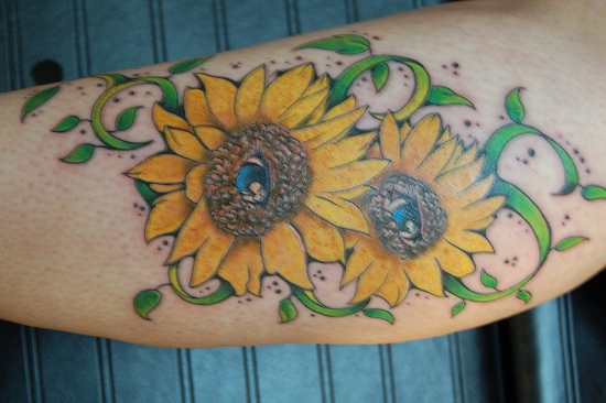 Eyes sunflower tattoo