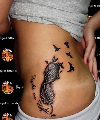 Feather Tattoo On Waist  Waist tattoos Feather hip tattoos Hip tattoos  women