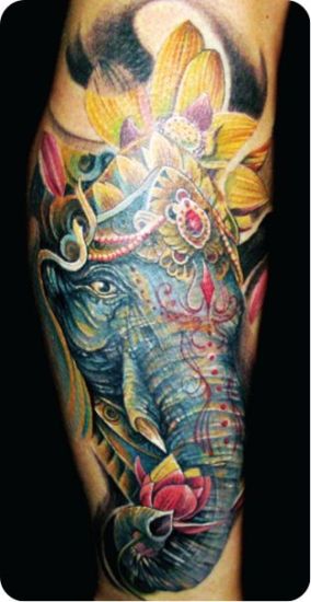 Lotus With Elephant Tattoo On Hand