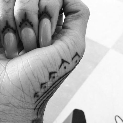 Cuticle Rihanna Tattoo Design