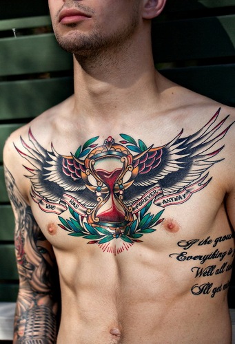Winged Cross Tattoo On Chest