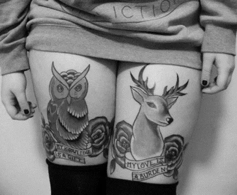 Colour realistic owl thigh tattoo