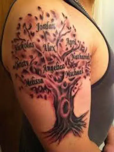Tree and bird on shoulder blade by Edward Lott TattooNOW