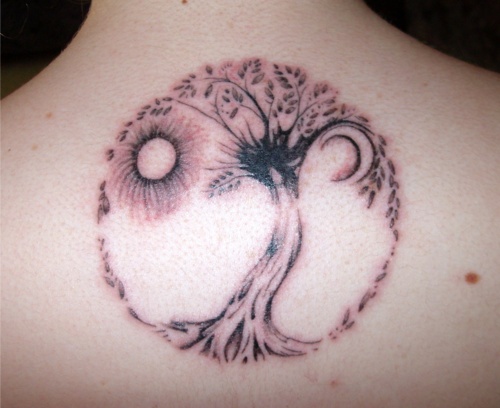 Sun And Moon With Tree Tattoo
