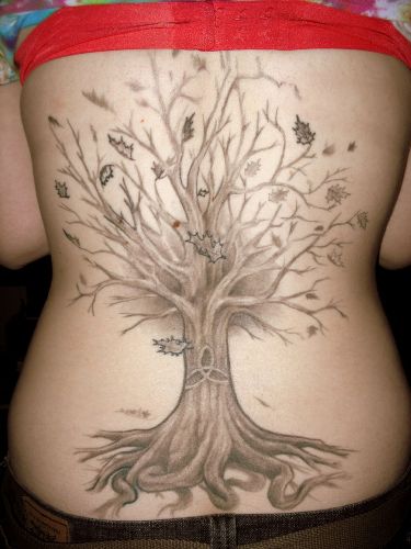 Tree Of Paradise Tattoo On Lower Back