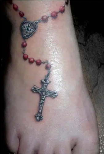rosary tattoo on foot painTikTok Search