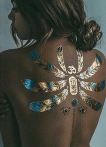 in metallic gold Tattoo
