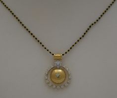 Simple Gold and Diamond Pendant