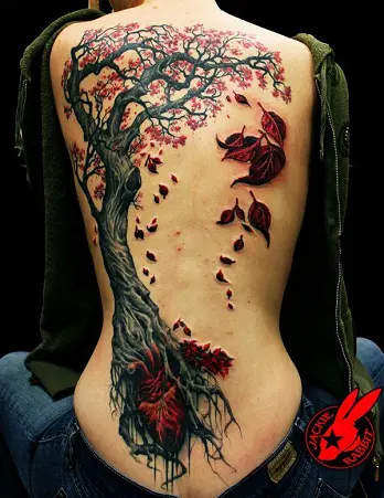 Tattoos by JenI Moss  A delicate tree down her spine  Facebook
