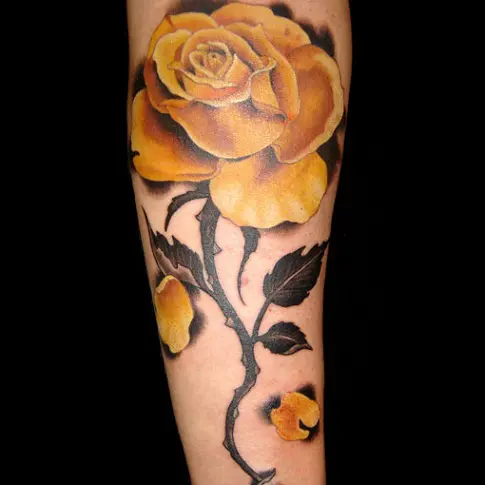 Realistic yellow roses on the chest