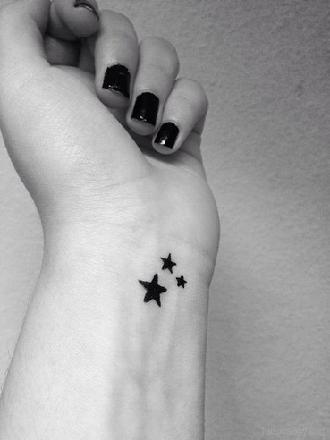 Black Star Pattern Tattoo