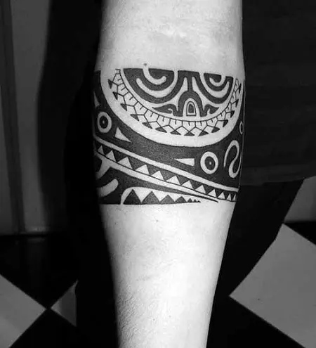 Mixed forearm and chestplate tattoo in Polynesian style flash