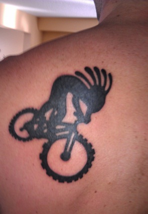 Kokopelli with Bicycle Tattoo Design