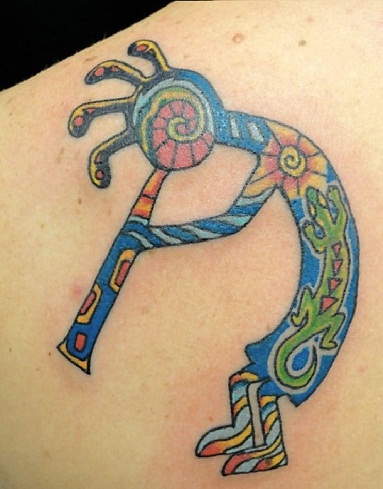 Multicolor Kokopelli tattoo