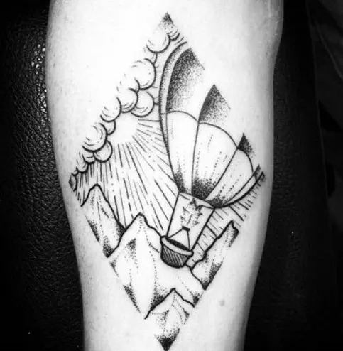 Hot air balloon tattoo located on the shoulder blade