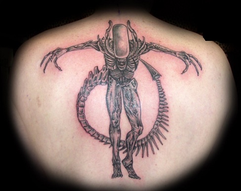 Striking Standing Alien Tattoo Design