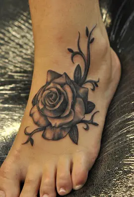 Black Ink Tribal Foot Tattoo For Girls