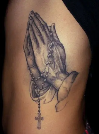 Rosary beads and praying hands Tattoo  Praying hands tattoo design Hand  tattoos pictures Praying hands tattoo