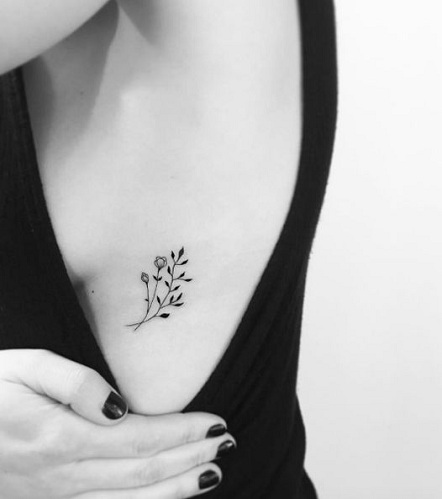 Small Floral Rib Cage Tattoo By Mary Tereschchenko
