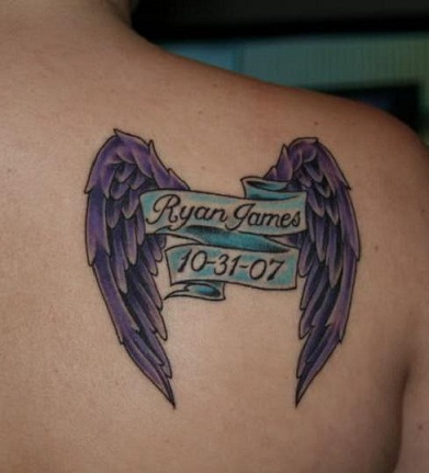 Angel wing banner tattoo