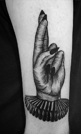 Artistic Witch Hand Tattoo Design