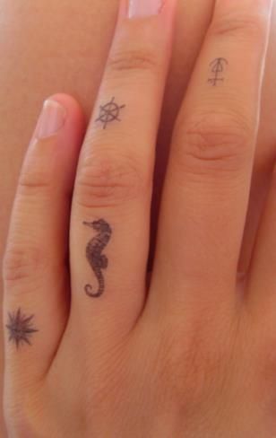 Finger Seahorse Tattoo