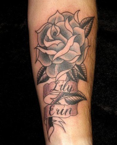 Floral banner tattoo