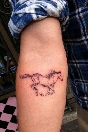 Horse Riding Tattoo